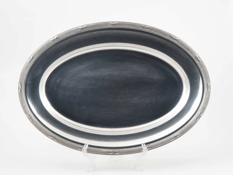 Christofle oval silver-plated metal plate with crossed ribbon border, SKU IB05821.