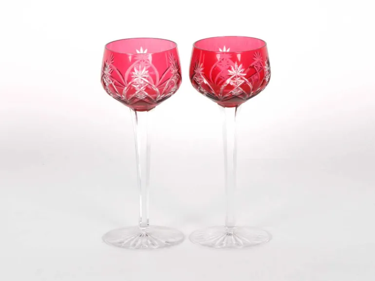 SKU IB06176: pair of red crystal-cut Rhin glasses with long clear stems, shown on a white background.