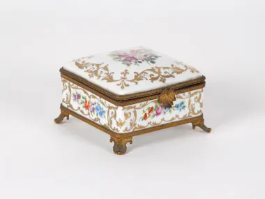 Le Tallec Porcelain box, SKU IB00019, white porcelain with floral decoration, gilt bronze mounts and four feet.