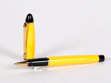 Aurora Ipsilon roller pen, yellow with gold trim and black cap, SKU IB02878.