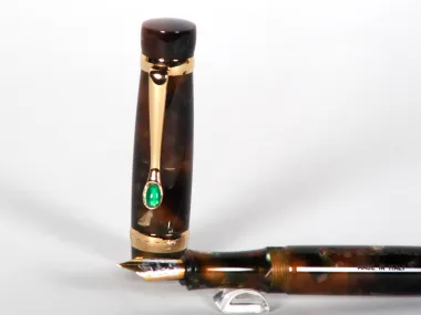 Stipula Fountain Pens IB02905 Castoni brown fountain pen with green agate trim, shown with gold nib on white background.