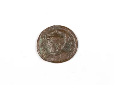 SKU IB03330: worn Roman bronze coin of Constantine I, showing a profile bust on the obverse.
