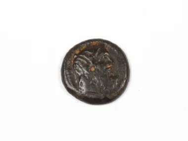 IB03396 Silver coin of Arados, tetrobol with Zeus head, shown on a white background.