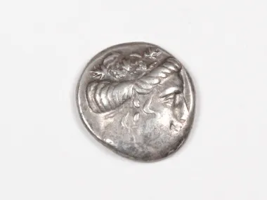 IB03450 Greek silver coin of Euboea Histiaea, showing a nymph's head in profile.