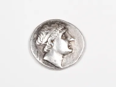 Greek silver tetradrachm coin of Antiochus I, obverse portrait visible, SKU IB03466.