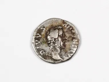 SKU IB03516: worn Roman silver denier coin of Antoninus Pius, shown on a white background.