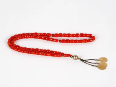 Masbaha rosary in red coral with silver pendant and three Ottoman coins, SKU IB03648.