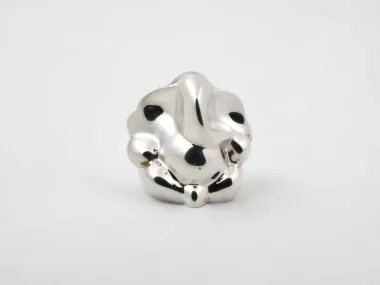 Sterling silver modern elephant sculpture, IB05986, shown front view with polished reflective surface.
