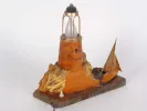 Art Deco wood and copper lamp, SKU IB00315, shaped like a lighthouse with a copper sailboat on the base.