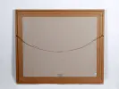 Back of framed engraving, IB00338, with brown paper backing and hanging wire.