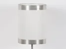 Chrome steel lamp base IB01200 with brushed metal cylindrical body and original shade, shown close up.