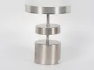 Chrome steel lamp base, IB01200, with brushed metal cylindrical sections and original shade, shown in close-up.