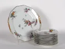 Limoges Porcelain cake set, SKU IB01668, with one large octagonal cake plate and stacked small plates, decorated with floral and bird motifs and gilt edges.