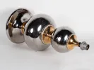 IB01916 ceramic lamp base with three reflective silver and gold spheres, circa 1960, shown without shade.