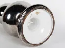 SKU IB01916: 1960s ceramic lamp base with two silver and gold painted spheres, shown from below with the original large silver lampshade.