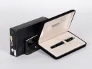 Aurora IB02690 fountain pen in emerald green with gold trim, shown in open presentation box.