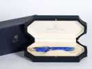 Michel Perchin IB02732 Fleur de Lis fountain pen in blue enamel, shown in its presentation box.