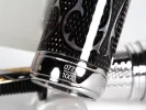 Michel Perchin Monogram fountain pen, black enameled barrel with sterling silver trim, showing SKU IB02739 and limited edition number 0771/1000.