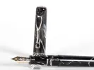 Visconti IB02772 Kaleido Voyager fountain pen in marbled black with silver trim and 18K gold nib, shown close up.