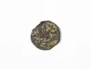 Bronze coin of the First Jewish Revolt with worn vine leaf and chalice, SKU IB03410.