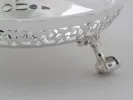 EPNS silver-plated metal centerpiece, SKU IB04699, with openwork sides and claw-shaped foot visible.