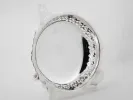 EPNS IB04699 silver-plated metal centerpiece with openwork rim on three claw feet, shown on a stand.