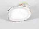 SKU IB05065: underside view of a small porcelain girl figurine in a pink dress with a basket, marked and enameled, Germany, late 19th century.