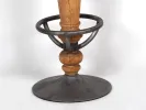 Hanbel bar stool, SKU IB05632, with solid wood center and brushed grey metal footrest and base shown in close-up.