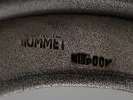 Close-up of a silver filigree piece stamped Hummet and Mibpoy, SKU IB05933.