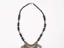 IB06052 necklace with black amber beads and a silver pendant with agate and cornelian, shown on a white background.