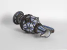 IB06326 Moroccan ceramic jug, blue and silver filigree, shown lying on its side.