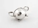 IB06548 Sterling silver helmet sauce boat with one handle and three feet, shown on a white background.