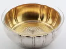 IB08138 by Eduard Wollenweber: gilded sterling silver bowl with engraved starburst base, shown in a top view.