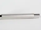 Faber Castell IB08548 Barley Rhodium Classique roller pen with silver-plated cap, shown in close-up.
