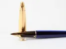 Waterman Edson fountain pen, SKU IB08936, with blue body, gold cap and trim, shown with nib exposed.