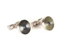 IB09281 pair of brushed white gold round cufflinks with cut blue sapphire center, shown on white background.