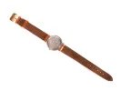 Montre bracelet Hermès Captain Nemo, SKU IB09290, vue de dos avec boîtier argenté et bracelet Fred en lézard marron sur fond blanc.