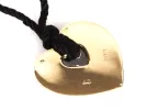 Poiray Secret Heart pendant, SKU IB09701, yellow and white gold heart pendant on black cord, shown from the back with signature and number.