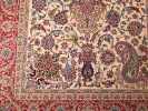 Persian Isfahan rug, SKU IB09703, showing a cream field with central medallion, birds, flowers, and foliage, with red border.
