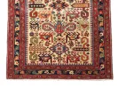 Caucasian Chirvan Kuba Perpedil rug, SKU IB09734, wool rug with geometric motifs, animals and flowers, shown in a colorful red and cream pattern.