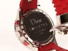 Dior Christal wristwatch, SKU IB09736, with red rubber strap and stainless steel case back visible.
